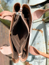 Image of the center interior divider zipper compartment of the Yipee Kiyay tote purse.