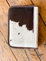 Picture of back of jewelry case made with white and dark brown cowhide