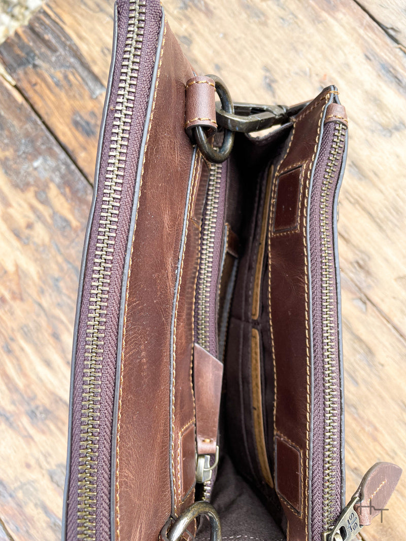 Photo of dark brown leather purse magnetic front pocket with card slots and zipper pocket