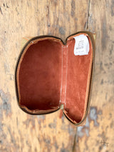 photo of inside of leather sunglass case with zipper closure