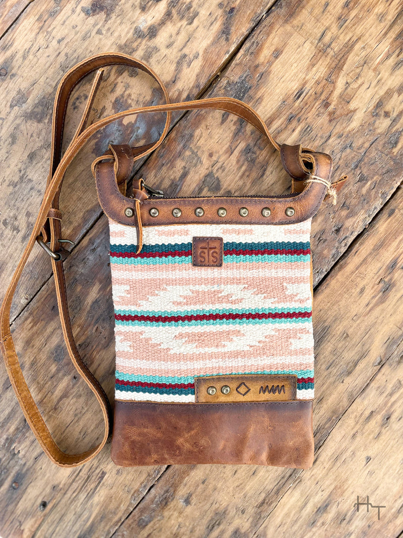 Photo of front of leather and pastel color aztec print woven fabric